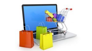 Web Design Company NJ | eCommerce - Laptop with Shopping Cart and Shopping Bags