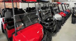 Golf carts lined up in the Golf Cart Factory showroom