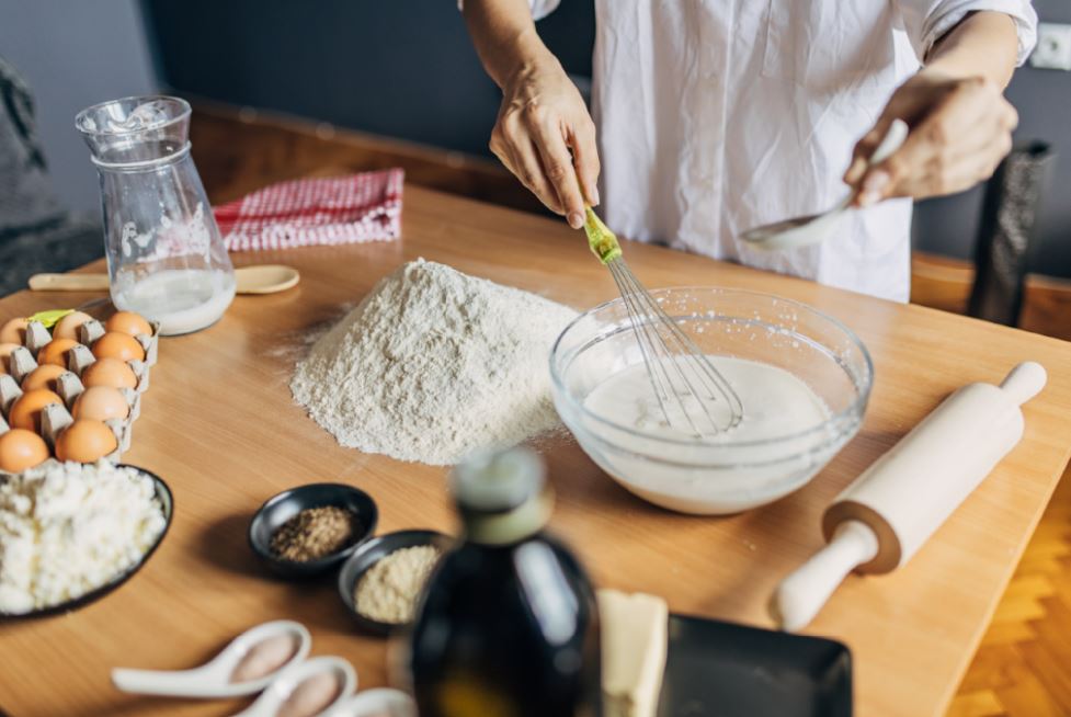 Baking ingredients illustrating how individual components combine to create a successful business growth formula