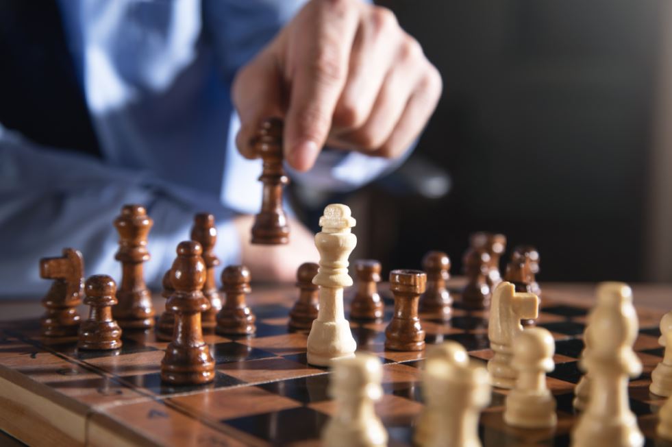 Chess pieces representing strategic planning, competitive positioning, and thoughtful business decision making
